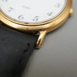 Seiko Spirit 5E21-6000 Gold Tone White Dial Quartz Watch - $70