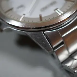 Seiko V147-0AF0 Silver Dial Solar Quartz Watch - $80
