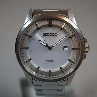 Seiko V147-0AF0 Silver Dial Solar Quartz Watch - $80