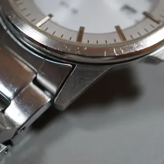 Seiko V147-0AF0 Silver Dial Solar Quartz Watch - $80