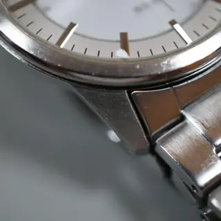 Seiko V147-0AF0 Silver Dial Solar Quartz Watch - $80